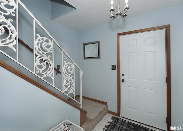 foyer featuring a notable chandelier and light tile patterned floors