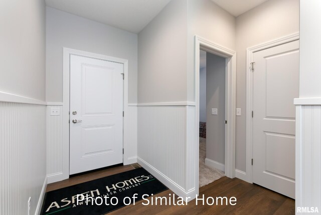 LOT38 Frank Ct, Le Claire, IA 52753 - doorway to outside featuring dark wood-type flooring and a wainscoted wall