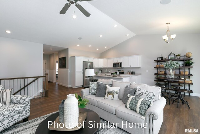 LOT38 Frank Ct, Le Claire, IA 52753 - living room featuring ceiling fan with notable chandelier, vaulted ceiling, recessed lighting, and dark wood-type flooring