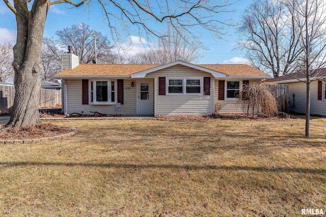 ranch-style home with a front yard