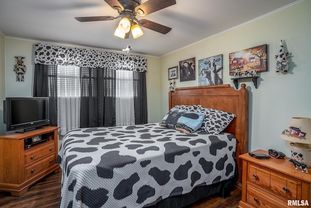 bedroom with ceiling fan, ornamental molding, and dark hardwood / wood-style flooring