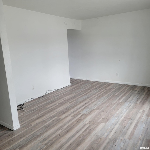 unfurnished room featuring light hardwood / wood-style flooring