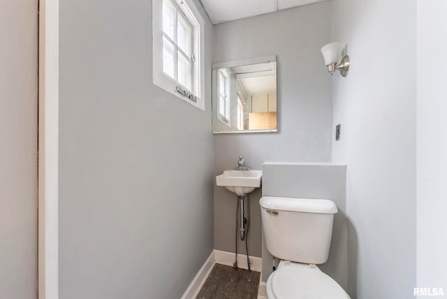 bathroom featuring toilet