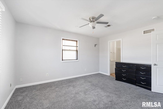 unfurnished bedroom featuring connected bathroom, ceiling fan, and carpet