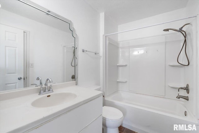 full bathroom featuring vanity, toilet, and tub / shower combination