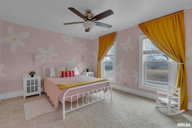 bedroom with ceiling fan and carpet flooring