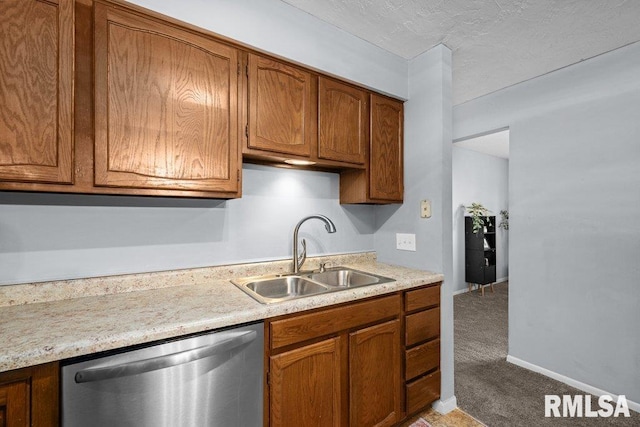 kitchen featuring light carpet, sink, and dishwasher