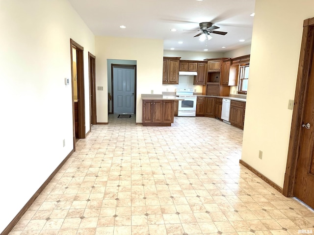 kitchen with white appliances and ceiling fan