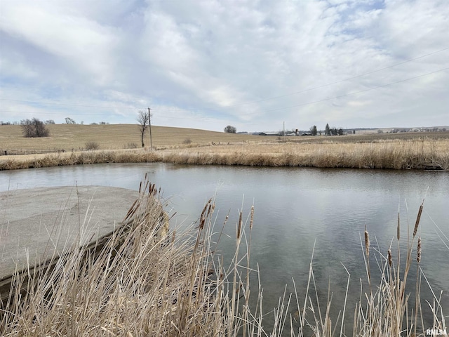 view of water feature with a rural view