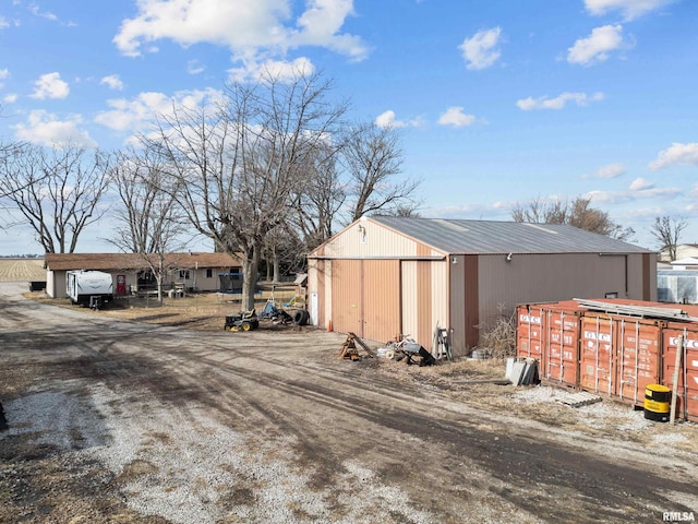 exterior space featuring an outbuilding