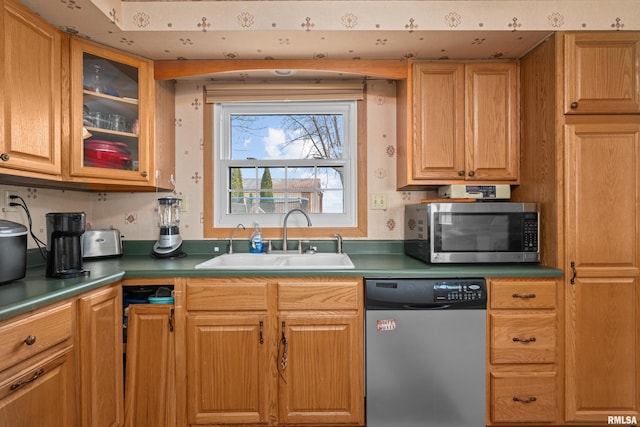 kitchen with appliances with stainless steel finishes and sink