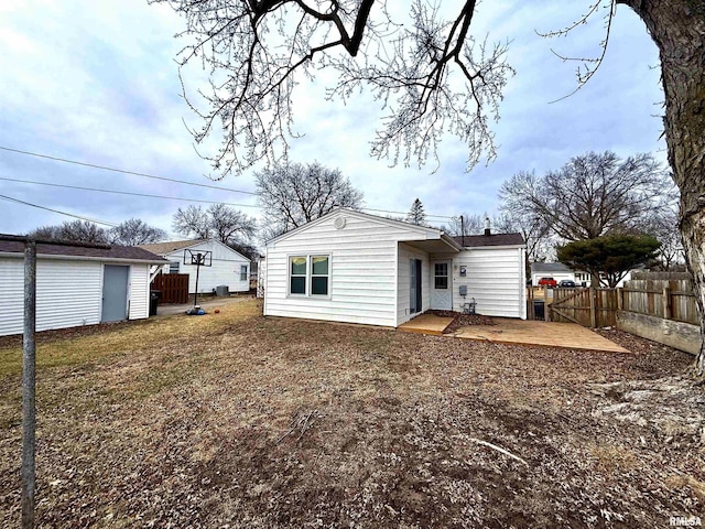 rear view of house with a patio