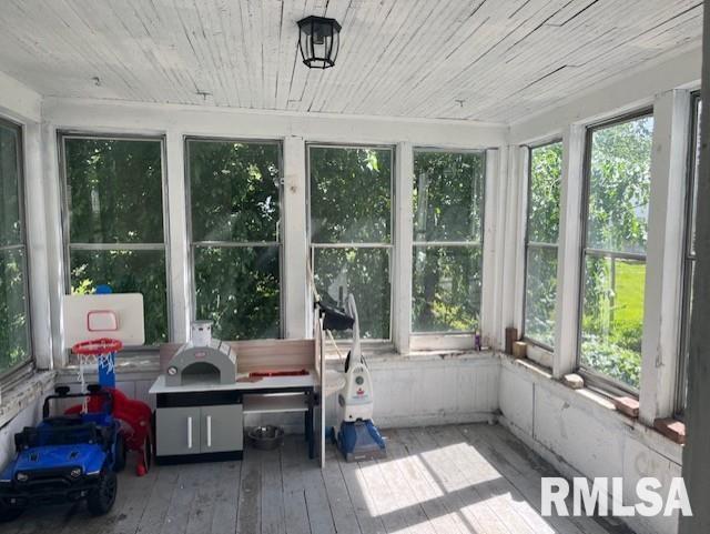 sunroom with wooden ceiling