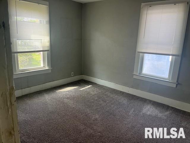 1015 Arlington Ct, Davenport, IA 52803 - carpeted spare room with baseboards