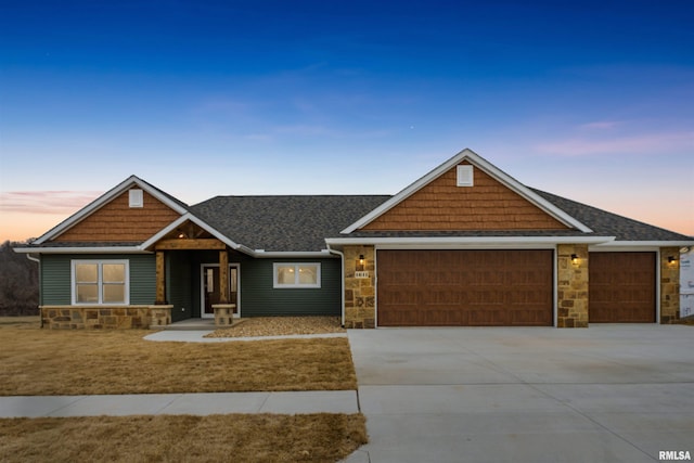 view of front of property with a garage