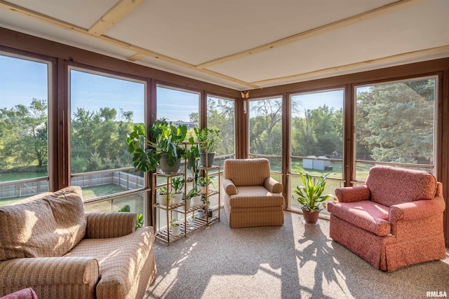 sunroom / solarium featuring a healthy amount of sunlight