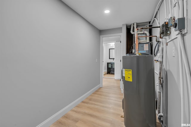 utility room with water heater