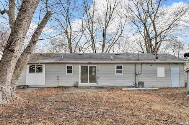 back of house featuring central AC and a patio area