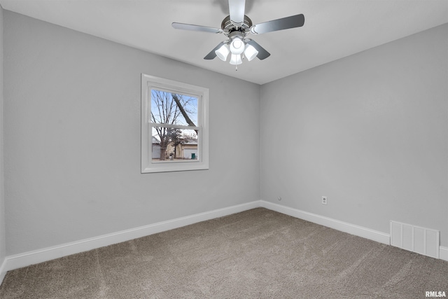 carpeted empty room with ceiling fan