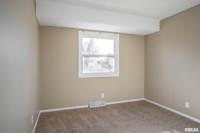 unfurnished room featuring carpet floors