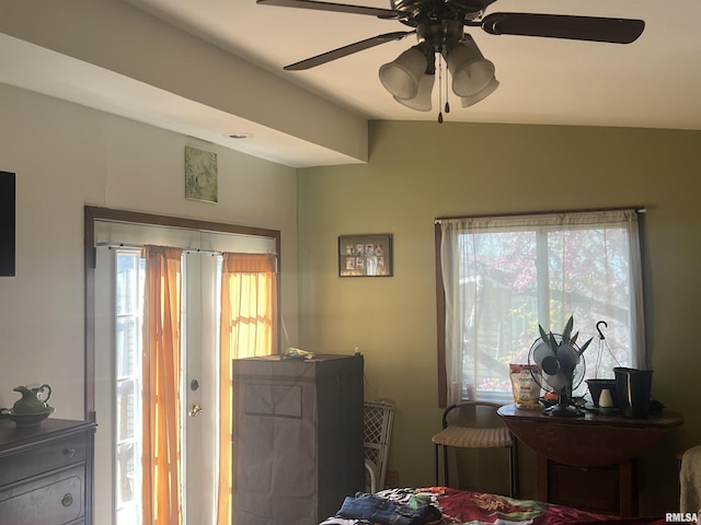 bedroom with ceiling fan and multiple windows