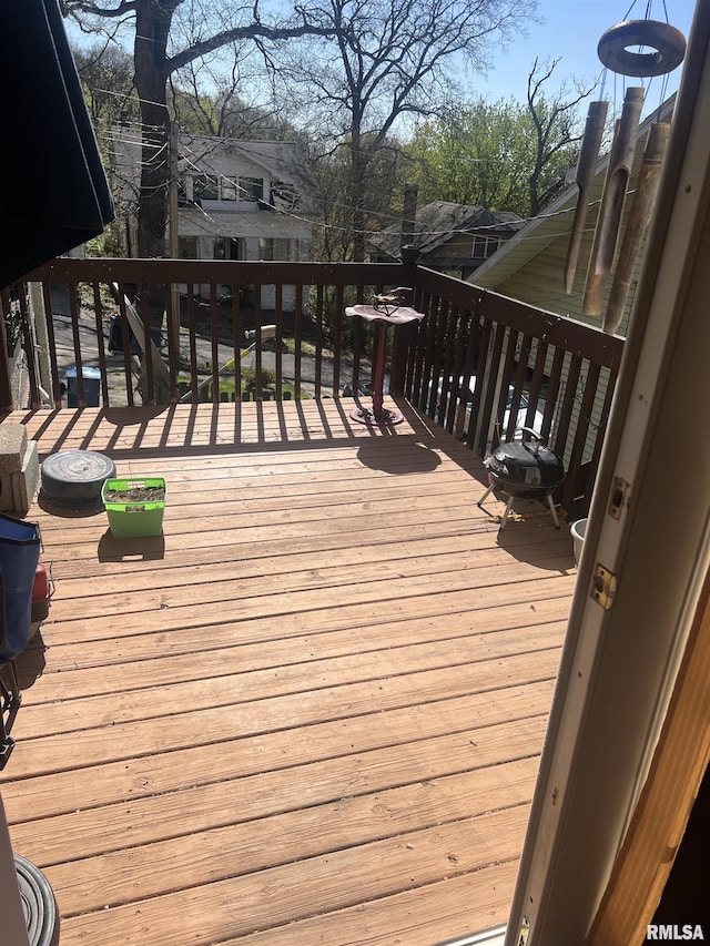 wooden deck with area for grilling