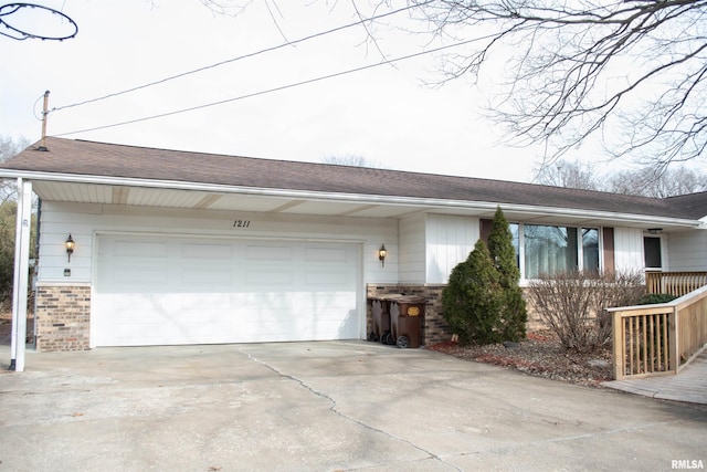 single story home featuring a garage