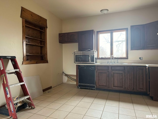 kitchen featuring light tile patterned flooring, dark brown cabinetry, black dishwasher, and sink