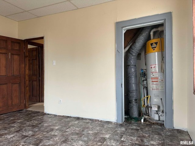 utility room with gas water heater