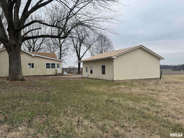 exterior space with a yard