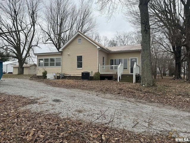 back of property with central AC unit