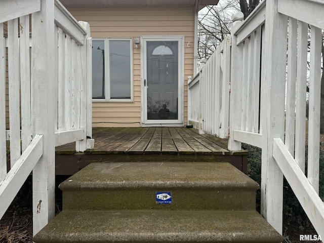 doorway to property with a deck