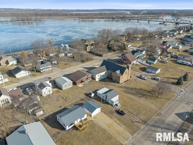 birds eye view of property with a residential view and a water view