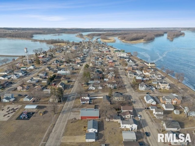 bird's eye view featuring a residential view and a water view