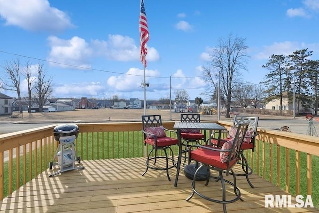 deck featuring a lawn