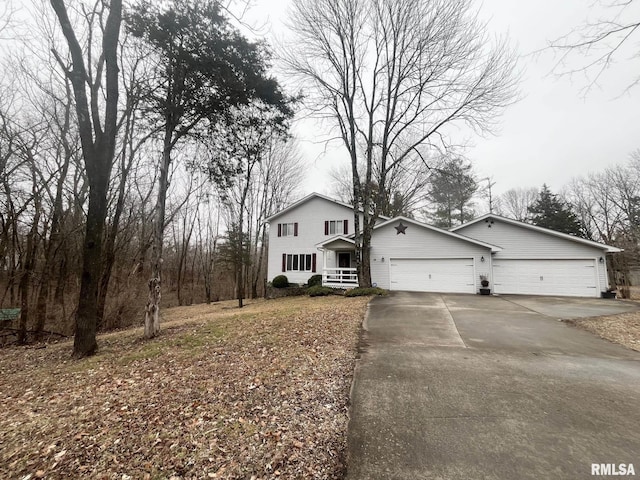 view of front of property with an attached garage and driveway