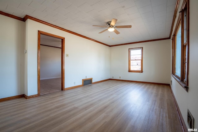 unfurnished bedroom with crown molding, ceiling fan, and light wood-type flooring