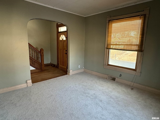 interior space with crown molding