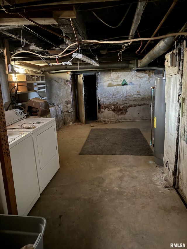 basement featuring gas water heater and washer and clothes dryer