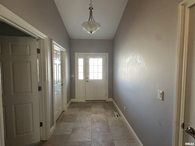 doorway with vaulted ceiling