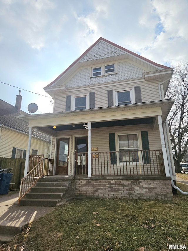 620 Sycamore St, Muscatine, IA 52761 - view of front of property featuring a porch and fence