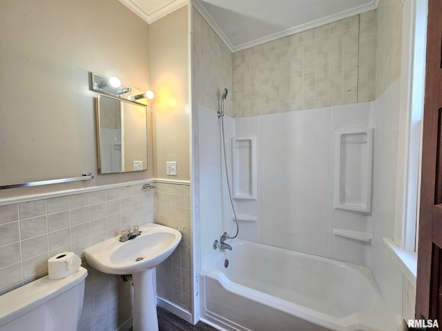 620 Sycamore St, Muscatine, IA 52761 - full bathroom with a sink, crown molding, shower / bathing tub combination, toilet, and tile walls