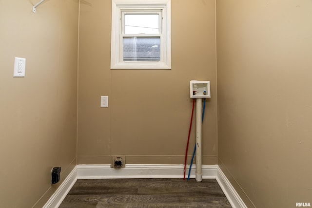 washroom with hookup for a washing machine and hardwood / wood-style flooring