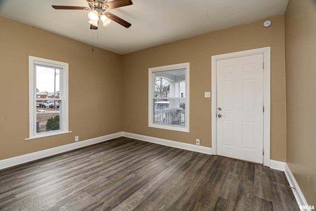 entrance foyer featuring dark wood-type flooring and ceiling fan