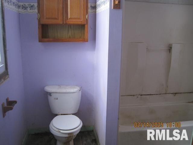 bathroom featuring toilet