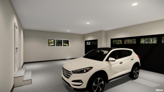 garage with baseboards and recessed lighting