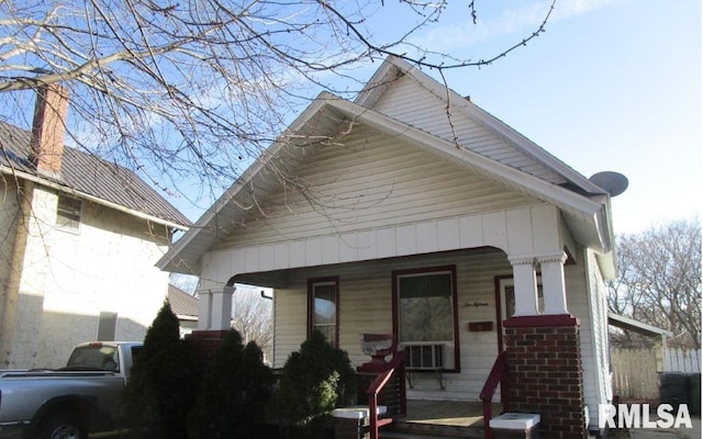 bungalow-style house featuring covered porch