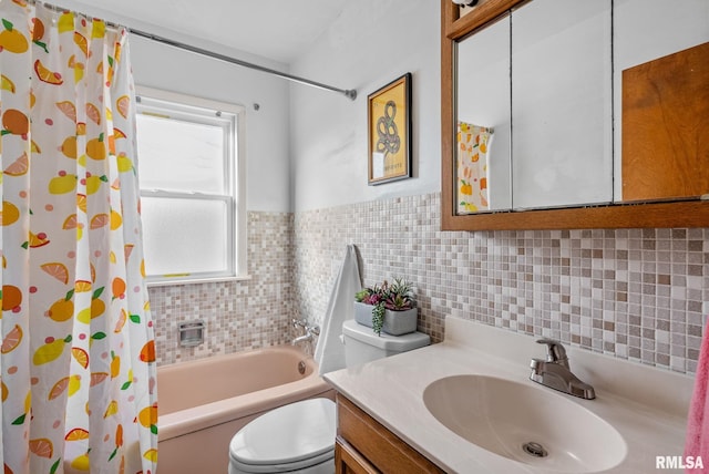 full bathroom featuring vanity, tile walls, shower / bath combination with curtain, and toilet