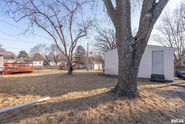 view of yard with a wooden deck