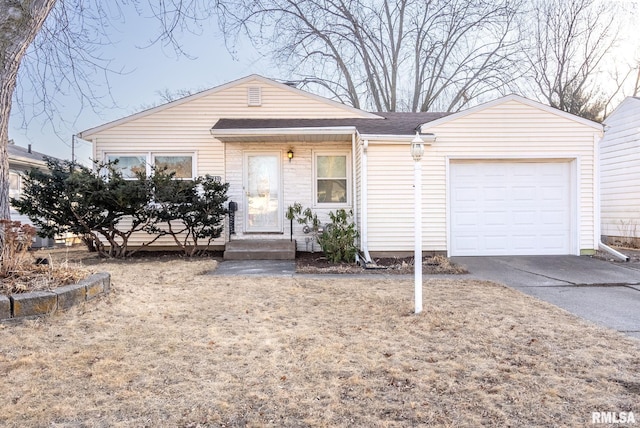 single story home featuring a garage